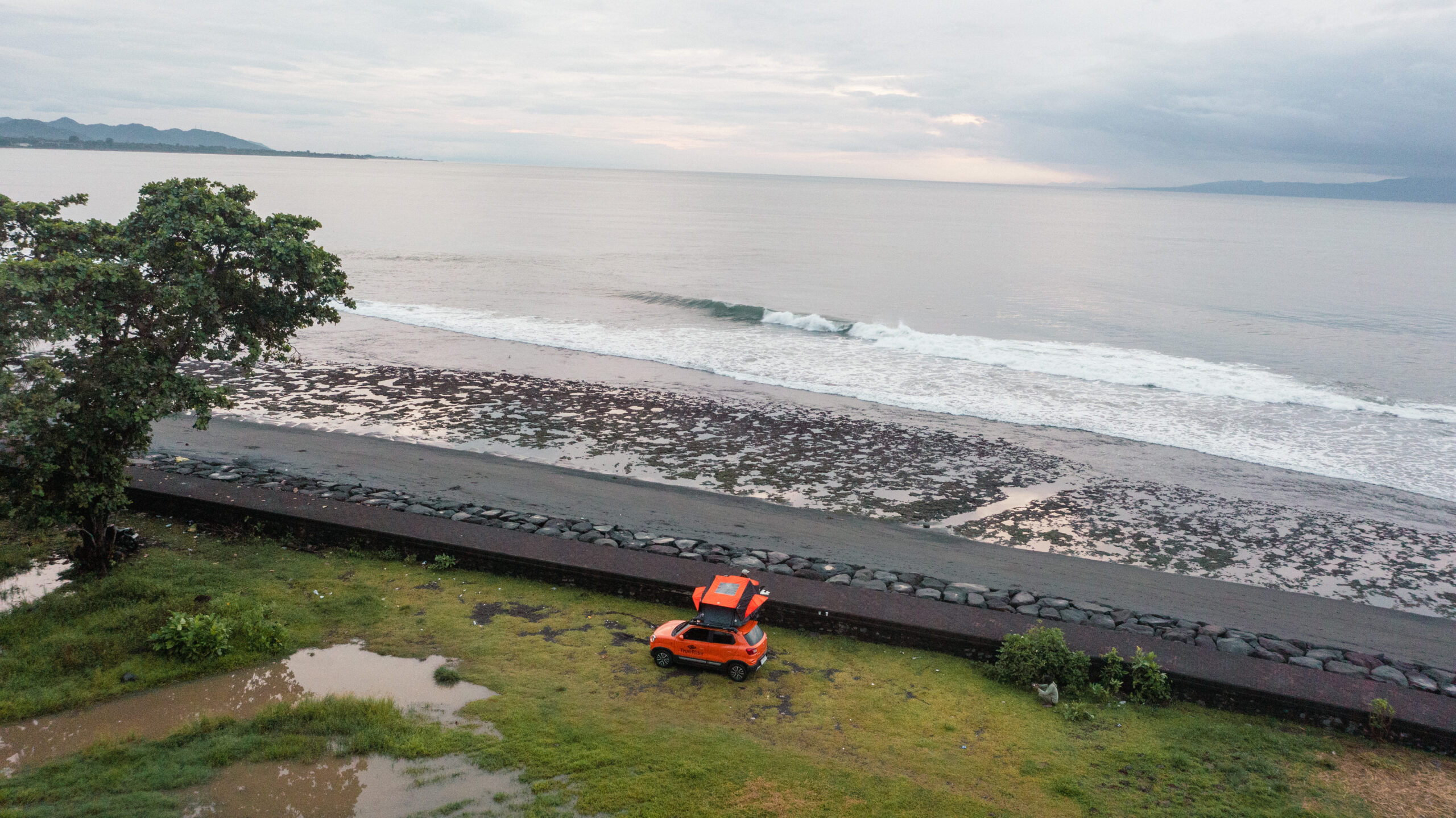 Aerial view of the camper on the coast