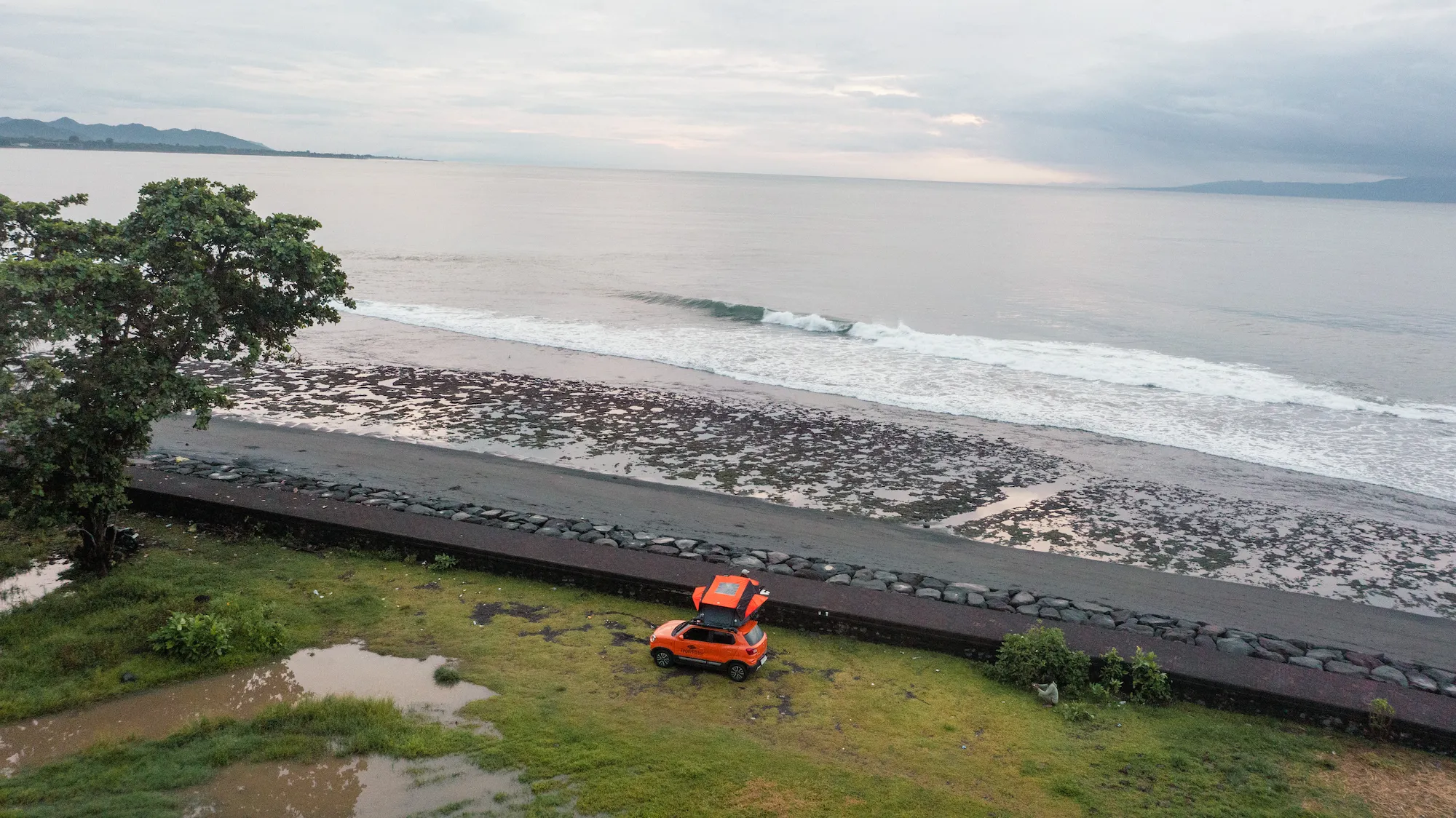 Aerial view of the camper on the coast